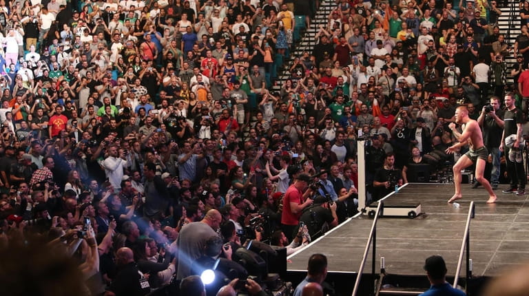 Conor McGregor of Ireland entertains the fans during the UFC...