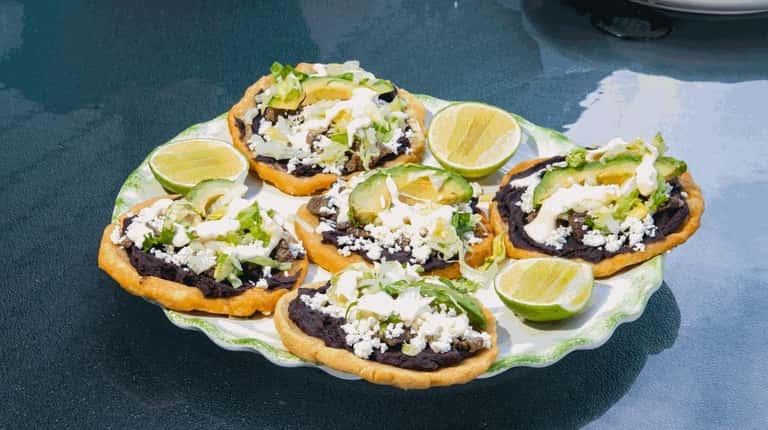 Sopes made by the Romero family at their home in...