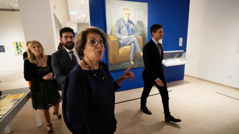 Guests tour the Sursock Museum's exhibitions after relaunching an opening...