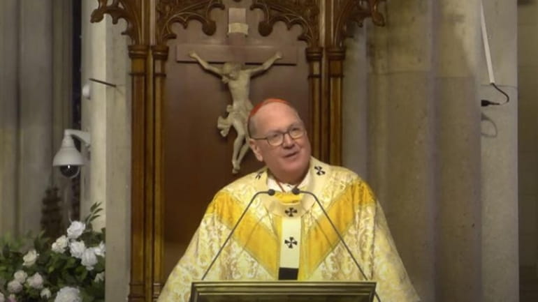 Cardinal Timothy Dolan speaks at an Easter Sunday Mass at...