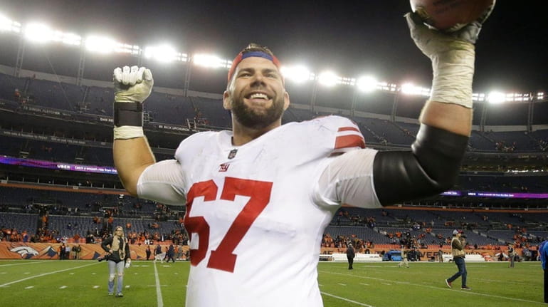 Giants offensive guard Justin Pugh celebrates after defeating the Broncos...