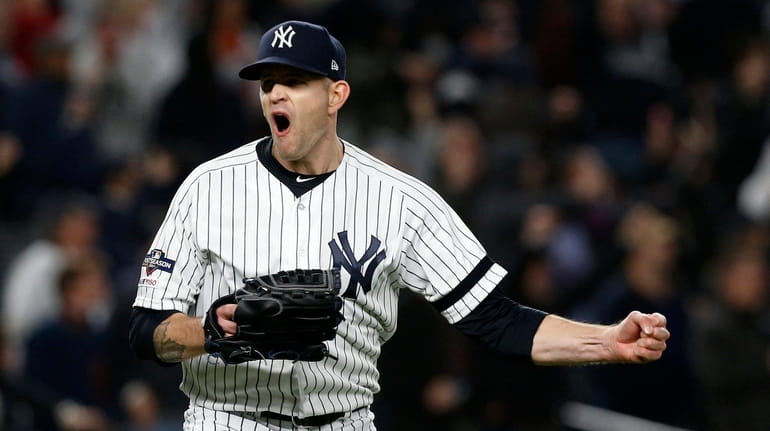 James Paxton #65 of the Yankees reacts after the final out...