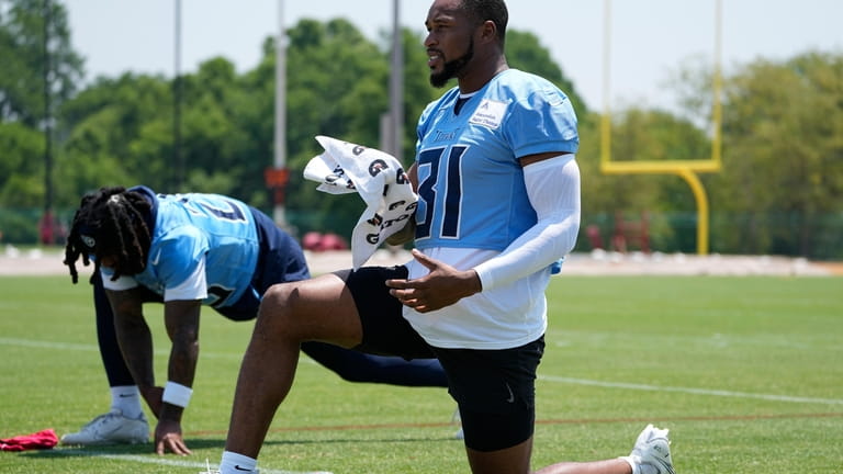 Tennessee Titans safety Kevin Byard (31) stretches during practice at...