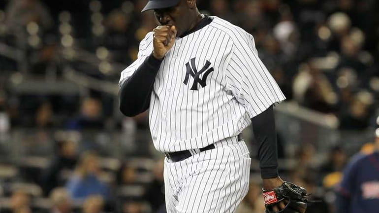 Rafael Soriano leaves the game after allowing four runs in...