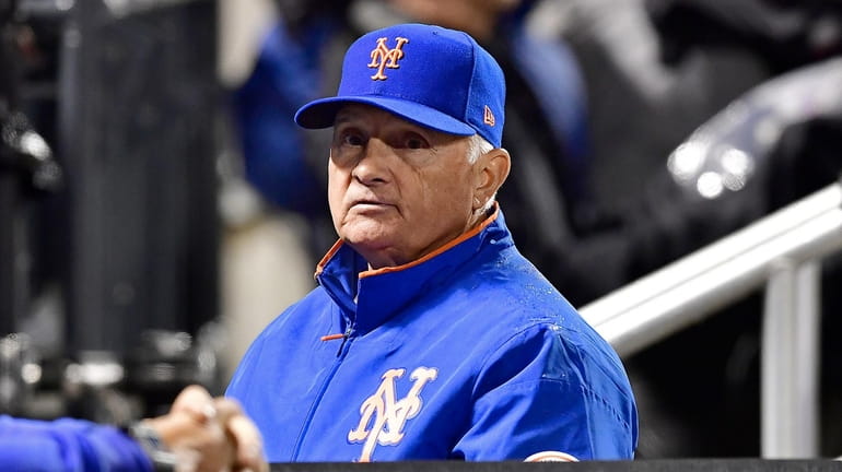 Terry Collins #10 of the New York Mets looks on...