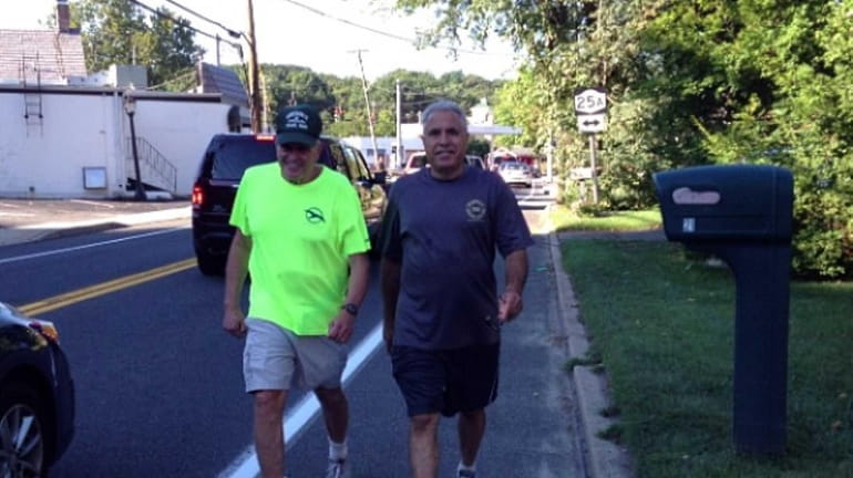 Barry Aronowsky, 72, of Greenlawn, left, and Greg Taha, 68,...
