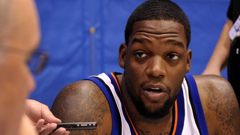 File - New York Knicks' Eddy Curry talks to the...