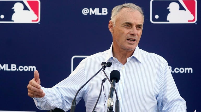 Major League Baseball Commissioner Rob Manfred speaks during a news...