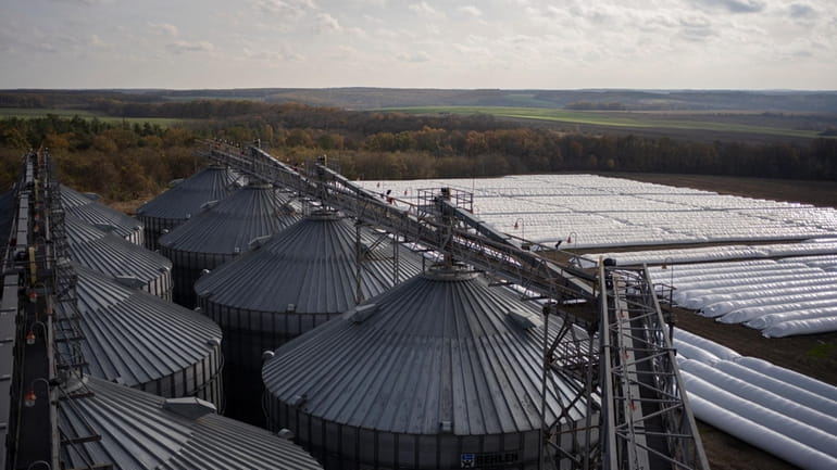An overhead view of silos at a grain handling and...