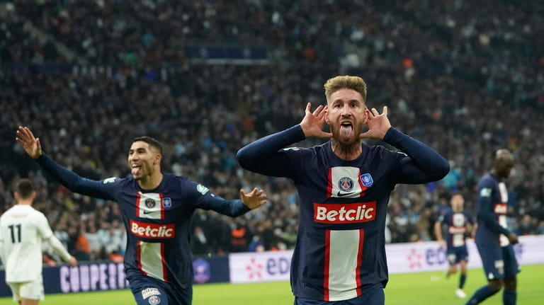 PSG's Sergio Ramos celebrates after scoring his side's opening goal...
