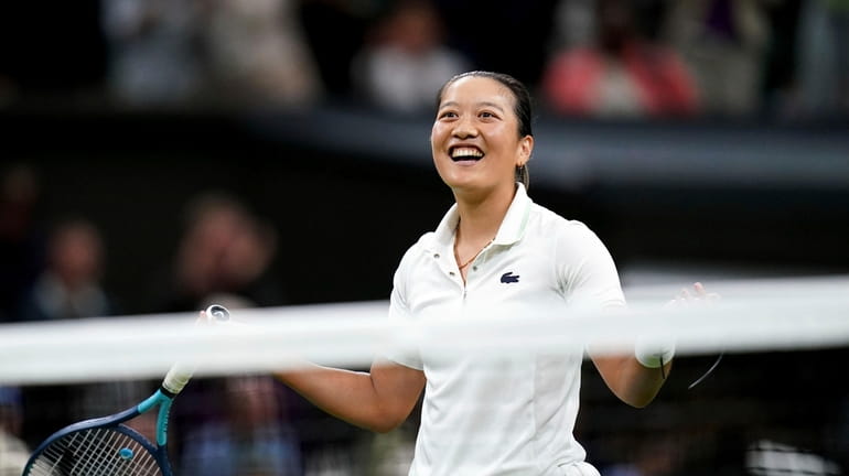 France's Harmony Tan celebrates after beating Serena Williams of the...