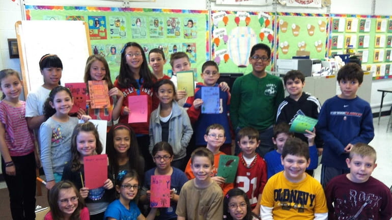 Students at Sawmill Intermediate School in Commack made holiday cards...