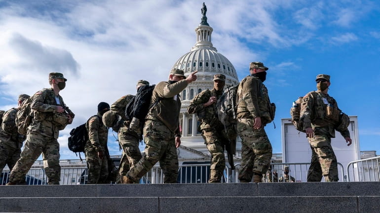 National Guard troops reinforce security around the U.S. Capitol ahead...