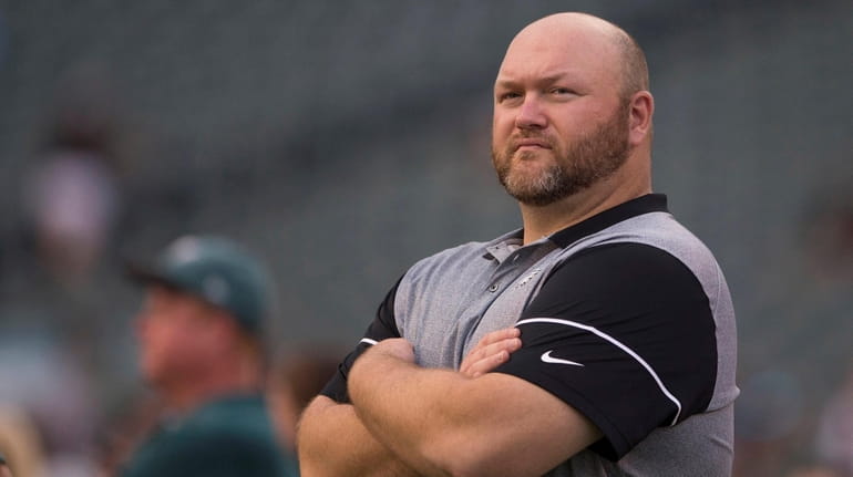 Joe Douglas, the Eagles' vice president of player personnel, looks...