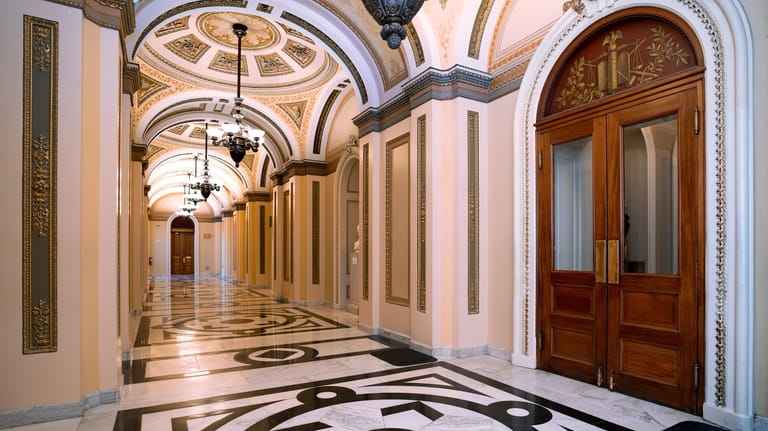 The doors to the House of Representatives chamber are shut...
