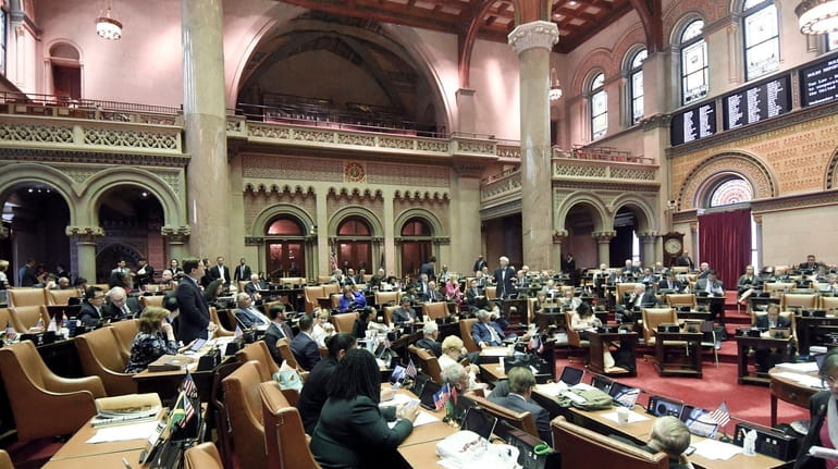 Members of the State Assembly debate legislation on Wednesday in...