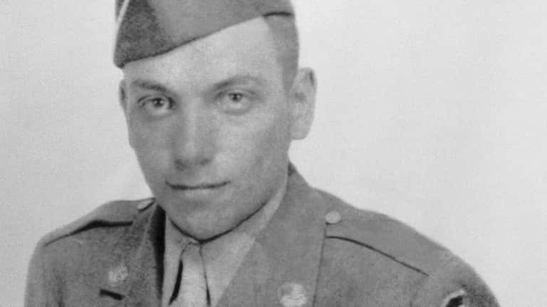 Photos of World War II veteran William Kellerman on display at...