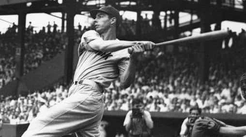 Joe DiMaggio hits at Griffith Stadium, Washington, D.C. on June...