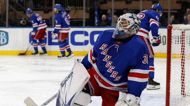 Henrik Lundqvist #30 of the New York Rangers and his...