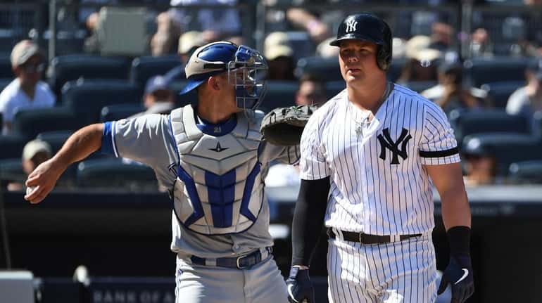 New York Yankees first baseman Luke Voit returns to the...