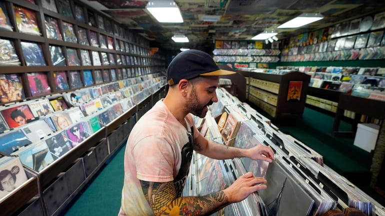 Jeff Maimon, of Chicago, checks out some vinyl at Tracks...