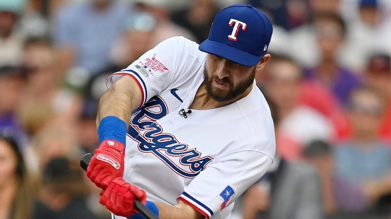 Joey Gallo of the Texas Rangers bats during the Home...