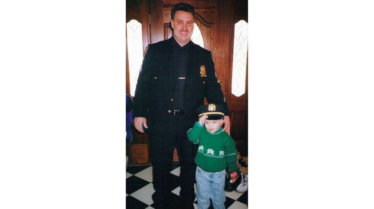 FDNY firefighter Liam Ryan and his father, NYPD Det. Sgt....
