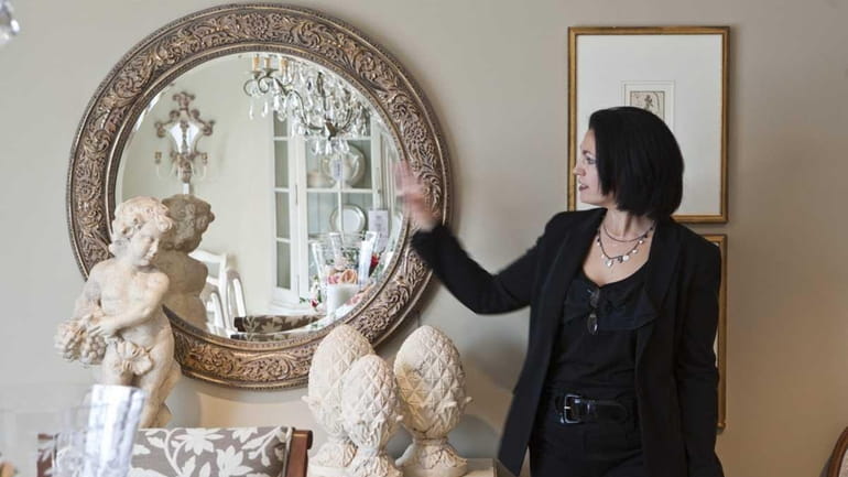 Dina Sapen of the Ethan Allen store in Huntington explains...