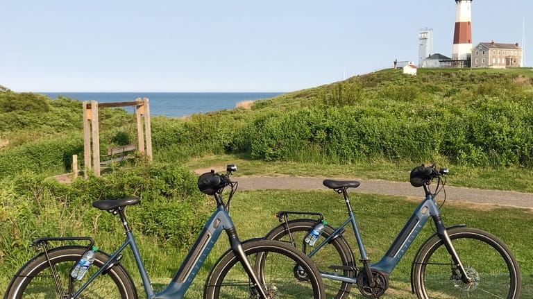 A pair of e-bikes, available for rent for touring Montauk,...