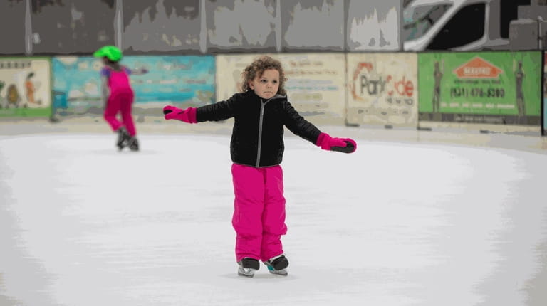 Clara Caldiero, 4, from Sound Beach gets her first ice...