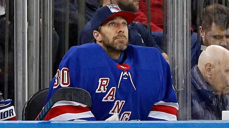 Henrik Lundqvist on the bench during the second period against the Montreal...