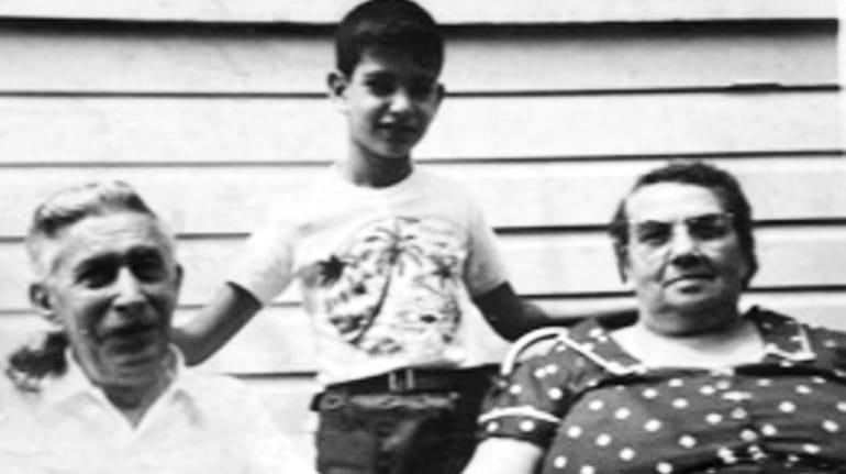 Thomas Fasullo, age 8, with his grandparents Jack and Giovanna...