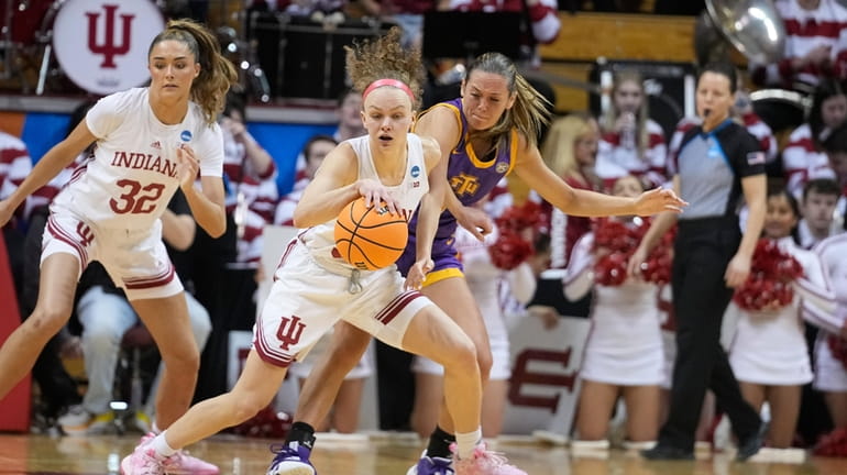 Indiana's Grace Berger, left, makes a steal against Tennessee Tech's...