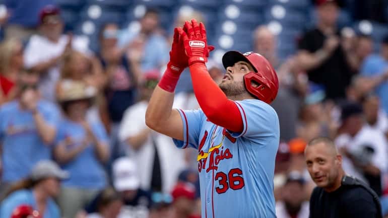 St. Louis Cardinals designated hitter Juan Yepez (36) gestures after...