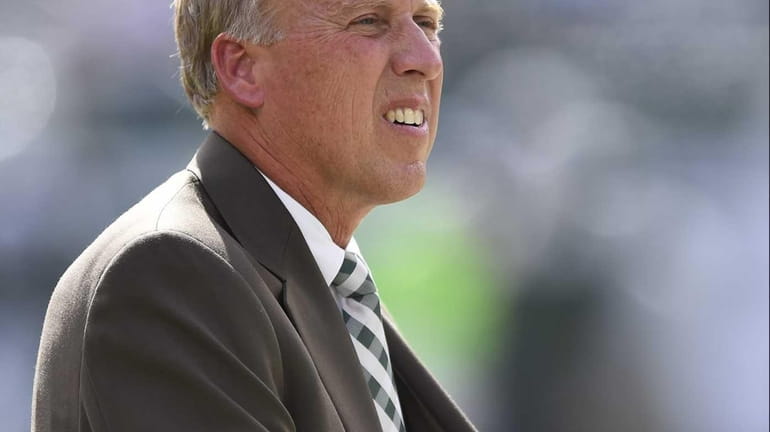 Jets GM John Idzik looks on before a game against...