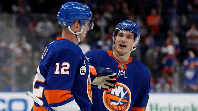 Josh Bailey #12 of the New York Islanders celebrates his...