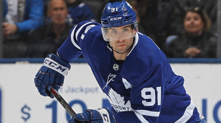 John Tavares of the Toronto Maple Leafs against the Montreal...