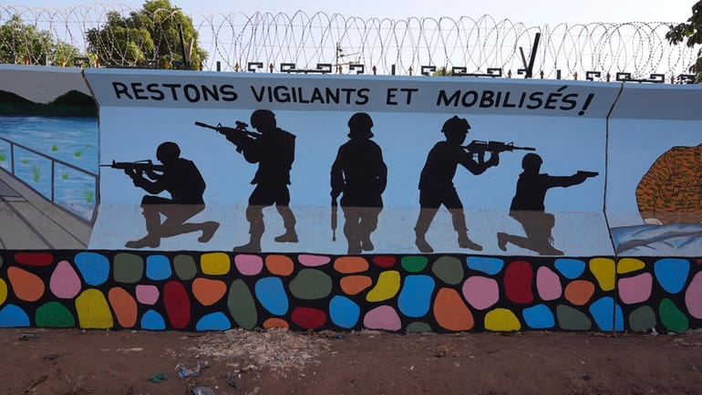 A mural is seen in Ouagadougou, Burkina Faso, Wednesday March...