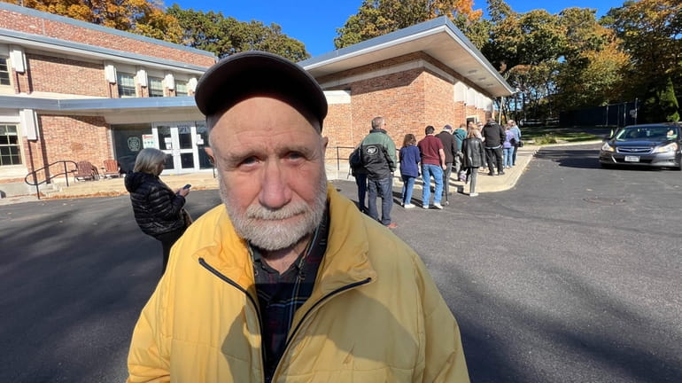 David Quigley, 76, of Dix Hills, voted early at the...