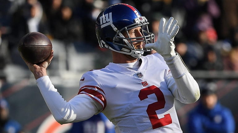 Mike Glennon of the Giants throws the ball in the third quarter...