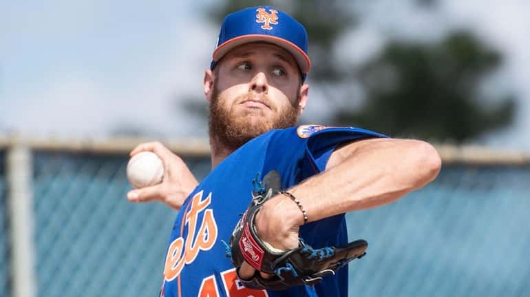 Mets pitcher Zack Wheeler throws a bullpen session on Feb. 17 during...