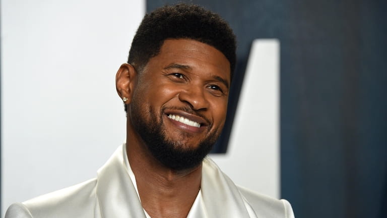 Usher arrives at the Vanity Fair Oscar Party on Sunday,...