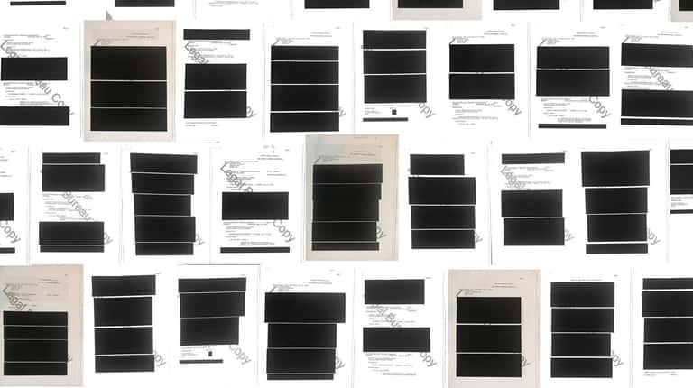 Examples of heavily redacted paperwork released to Newsday by the...