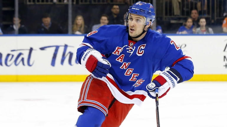 Ryan Callahan of the Rangers skates against the New Jersey...