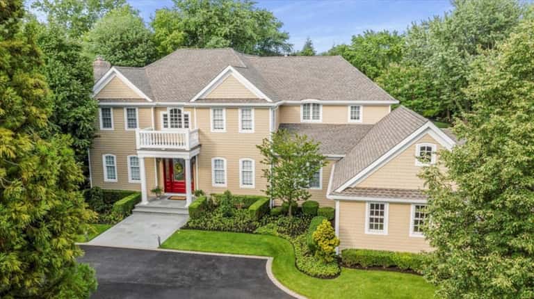 This 12-room Colonial on Schooner Road in Northport was built...