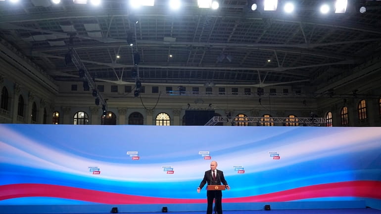Russian President Vladimir Putin speaks on a visit to his...