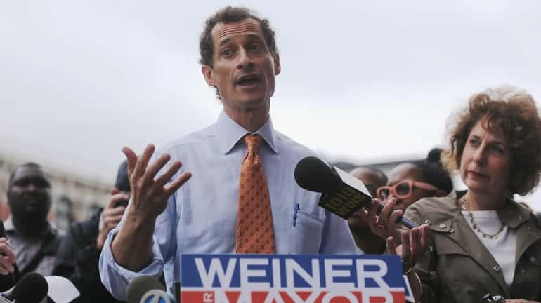 Anthony Weiner speaks to the media after courting voters outside...