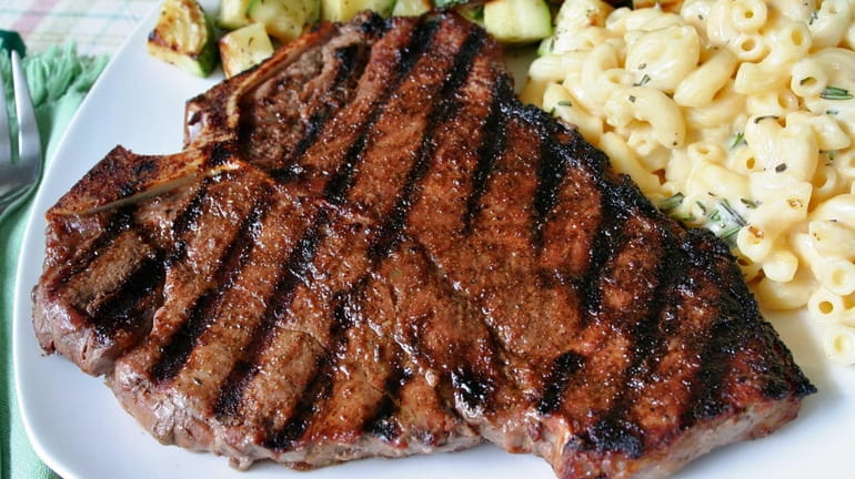 A grilled T-bone steak that's been rubbed with a smoky,...
