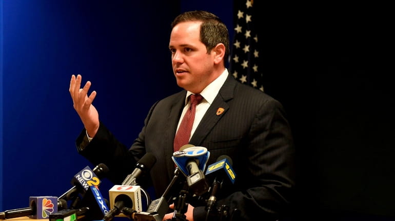 Justin Meyers at a news conference at Suffolk County police headquarters...