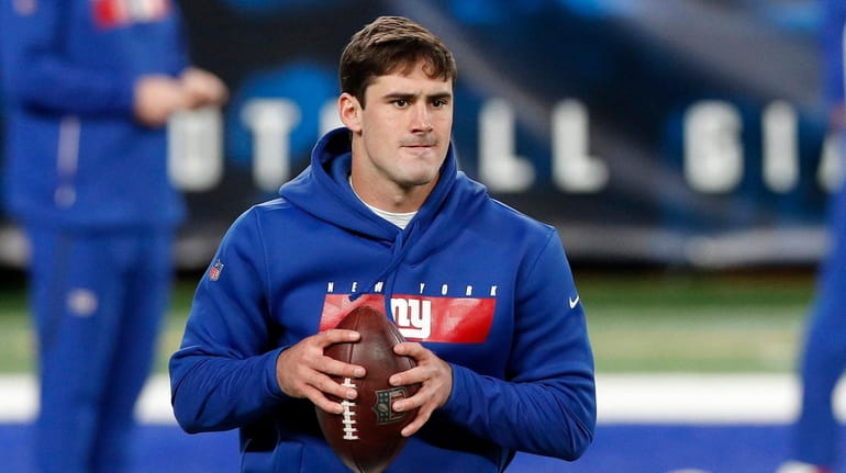 Daniel Jones of the Giants warms up on the field prior...